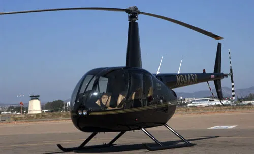 Helicopter ready for an aerial hog hunt at the ranch